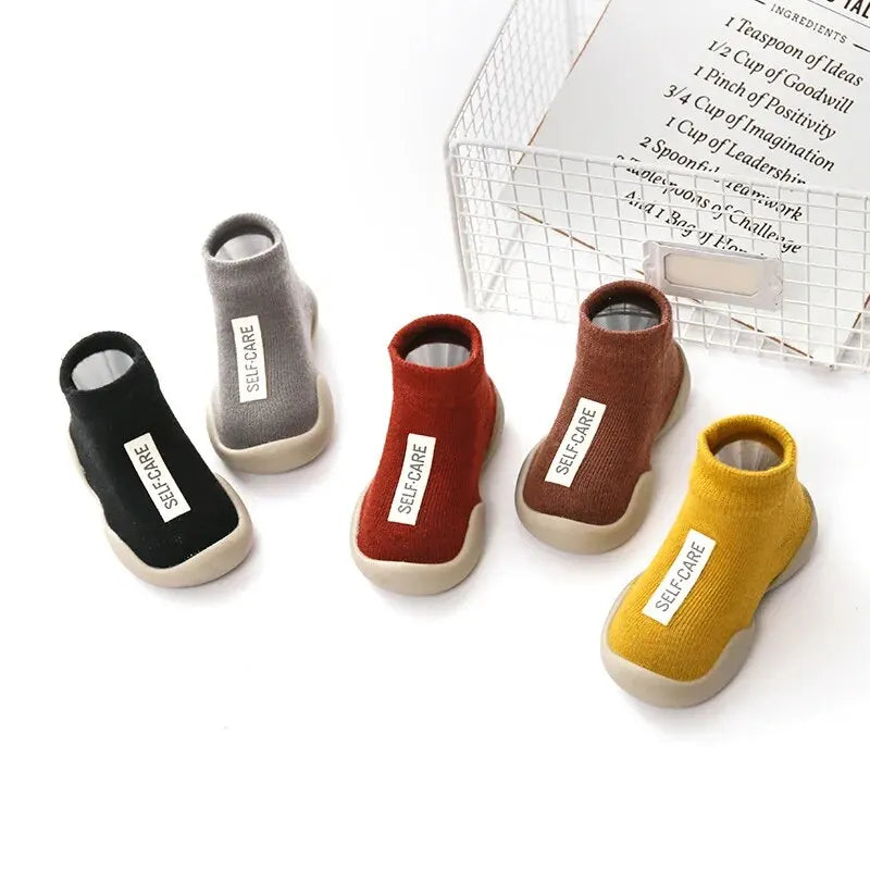 أحذية ميكيور بيبي الأولى - مشايات أطفال بنعل ناعم للأولاد والبنات | أحذية محبوكة للأطفال الرضع