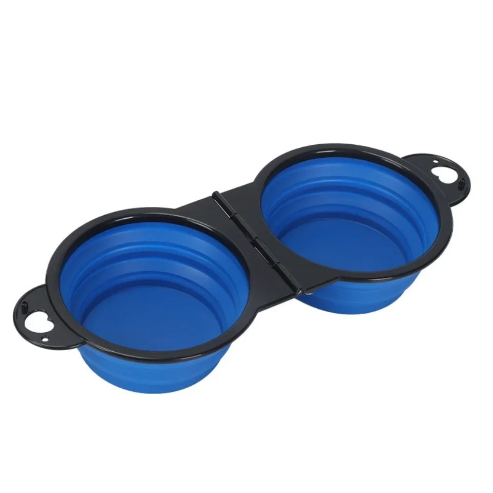 Blue and black collapsible pet bowls on a white background