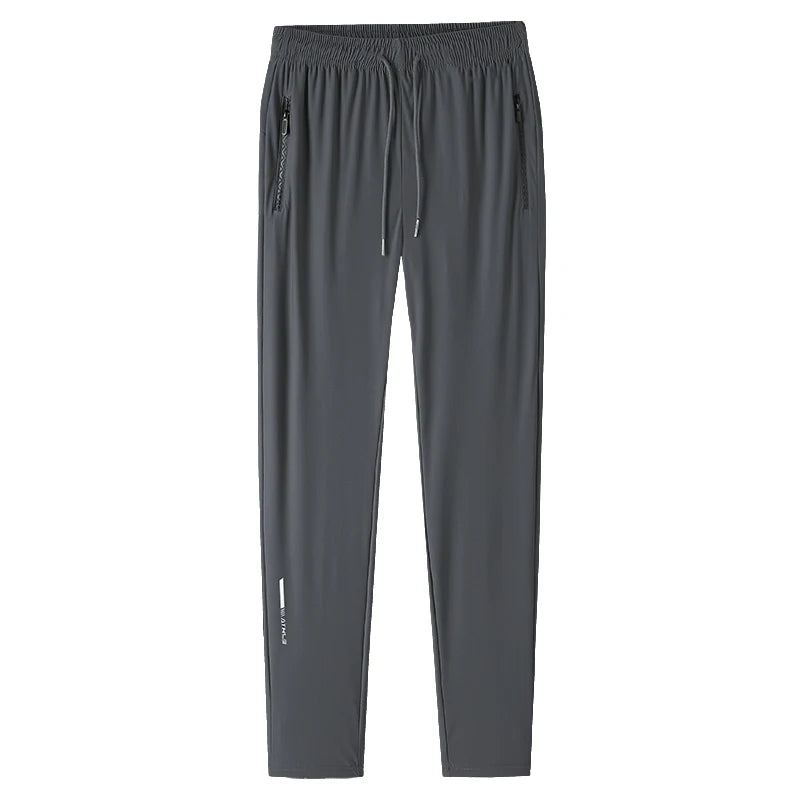 بنطلون رجالي من الحرير الجليدي بلون واحد - بنطلون صيفي مرن سريع الجفاف فضفاض للرياضة والعمل الكاجوال (M-8XL)